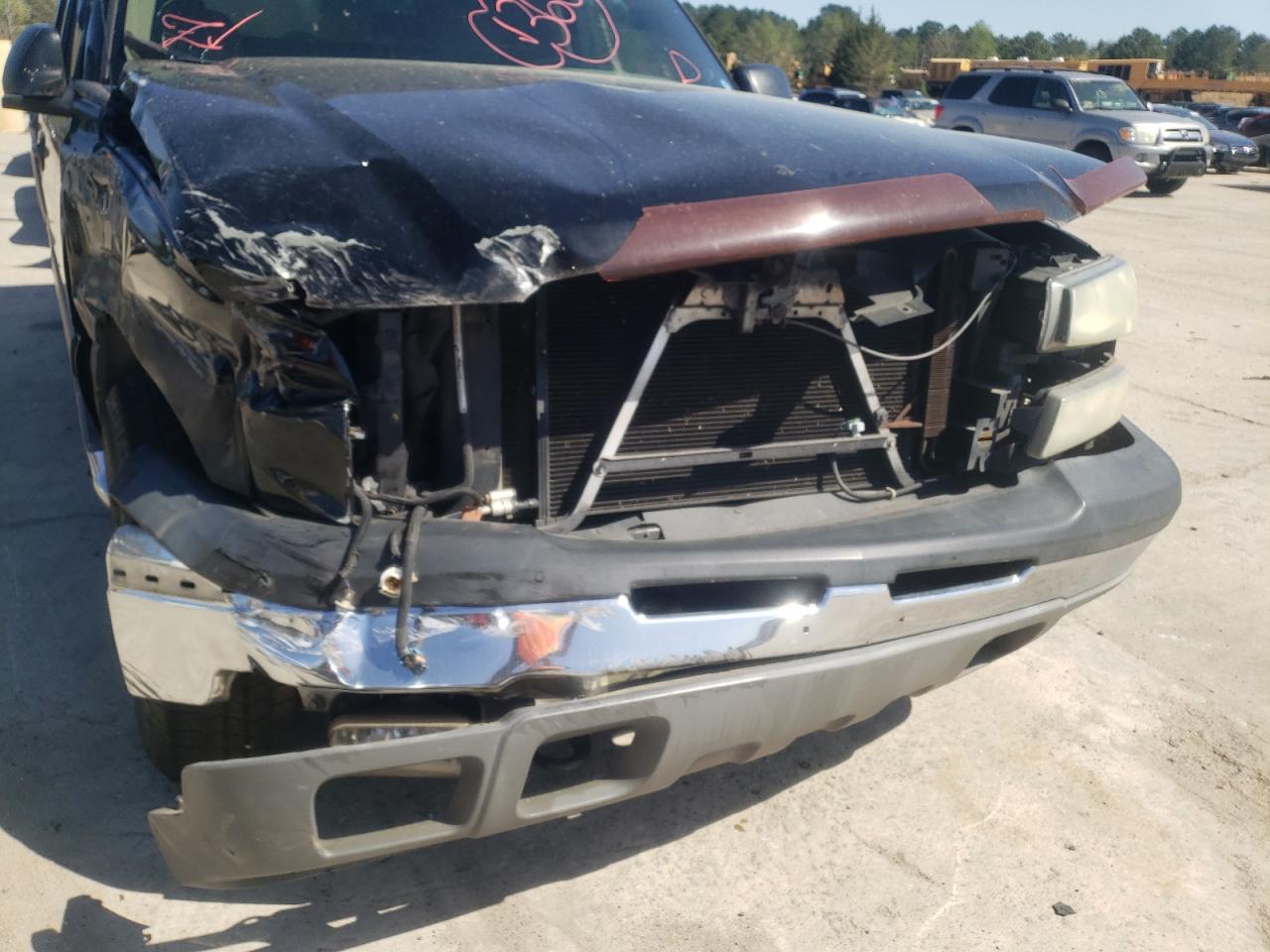 Photo 9 from auction – 2004 CHEVROLET AVALANCHE with VIN 3GNEC12T04G342843