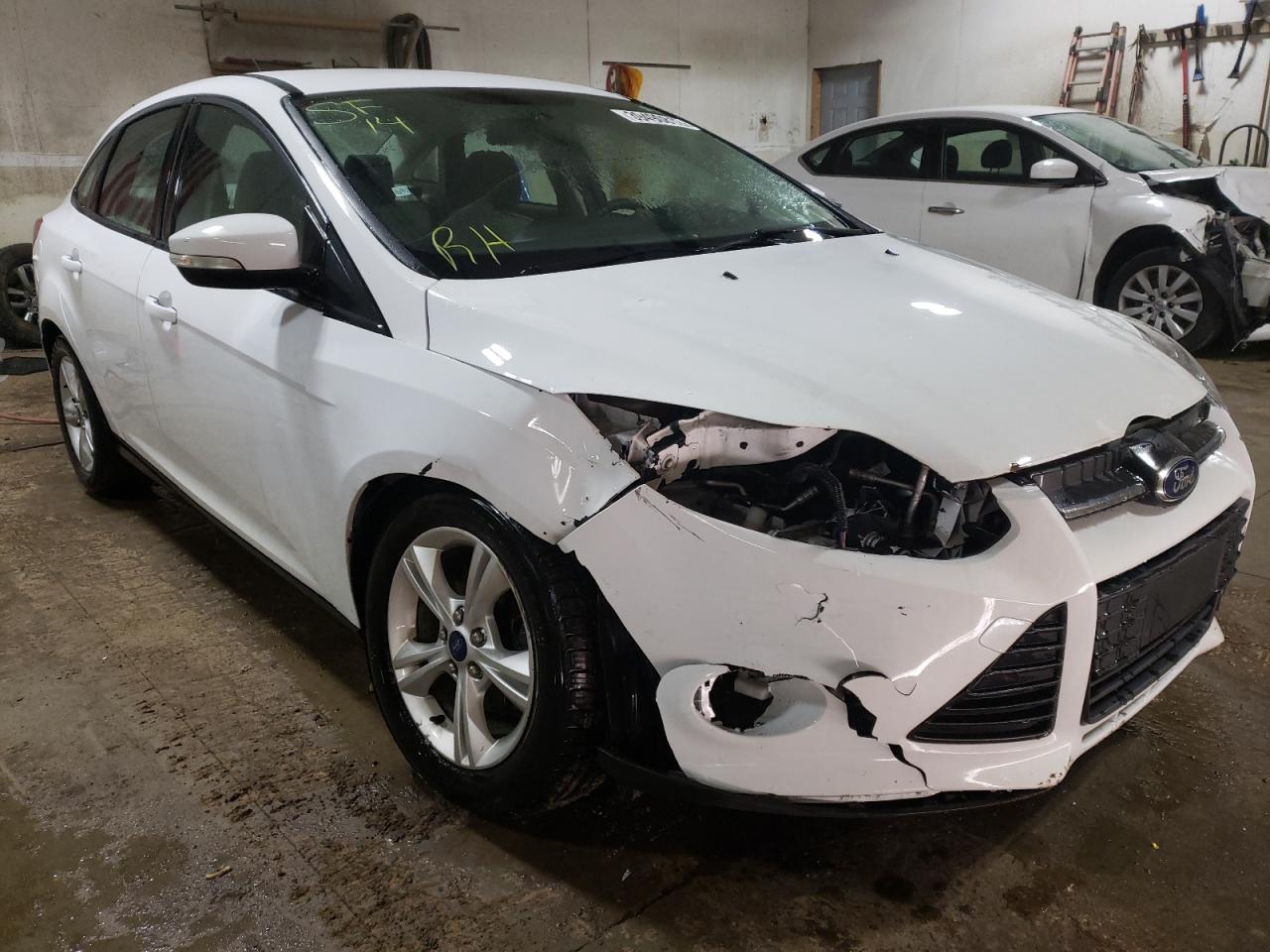 FORD FOCUS SE 2014 with VIN 1FADP3F27EL438677 - Photo from auction