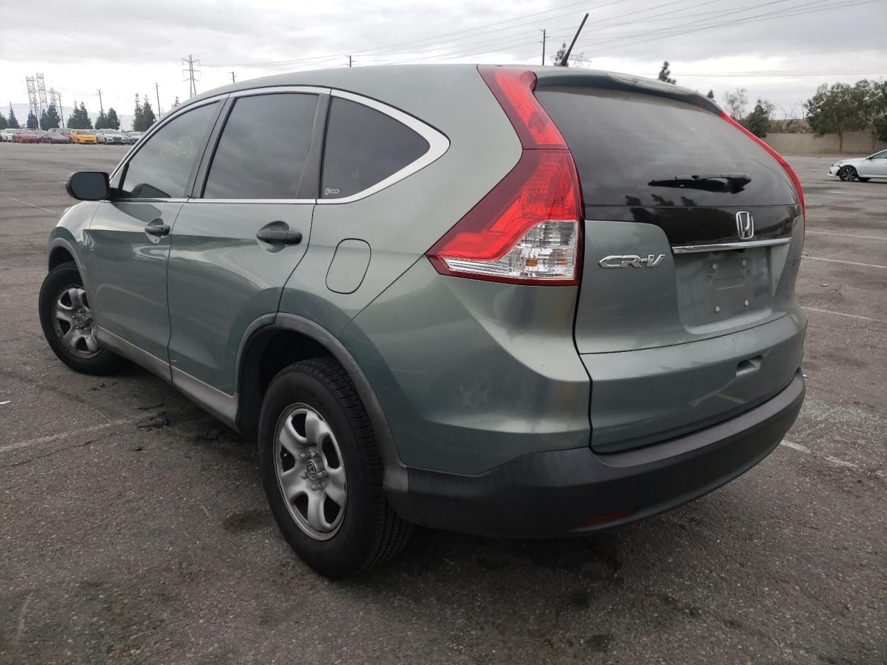 Photo 3 from auction – 2012 HONDA CR-V LX with VIN 2HKRM3H3XCH502159