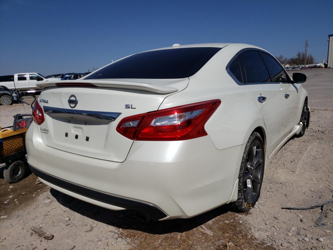 Photo 4 from auction – 2016 NISSAN ALTIMA 2.5 with VIN 1N4AL3AP5GC293434