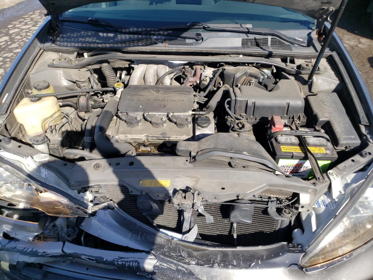 Photo 7 from auction – 2002 TOYOTA CAMRY LE with VIN JTDBF32K020064212