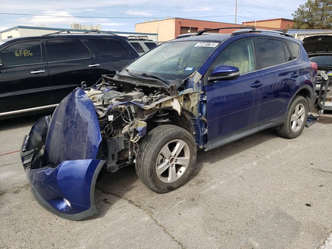 Photo 2 from auction – 2014 TOYOTA RAV4 XLE with VIN 2T3WFREV9EW077941