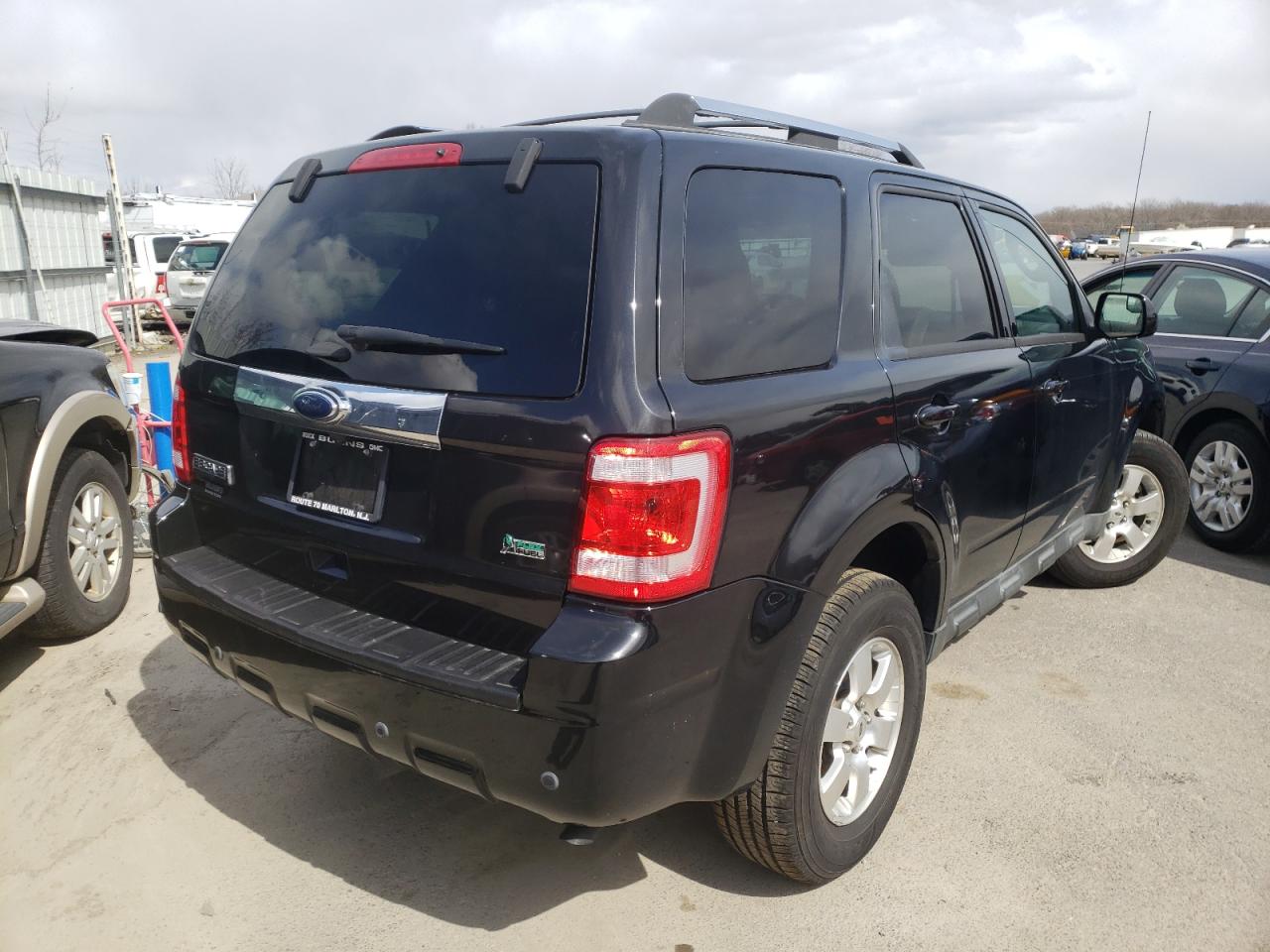 Photo 4 from auction – 2011 FORD ESCAPE LIM with VIN 1FMCU0EG3BKB88300