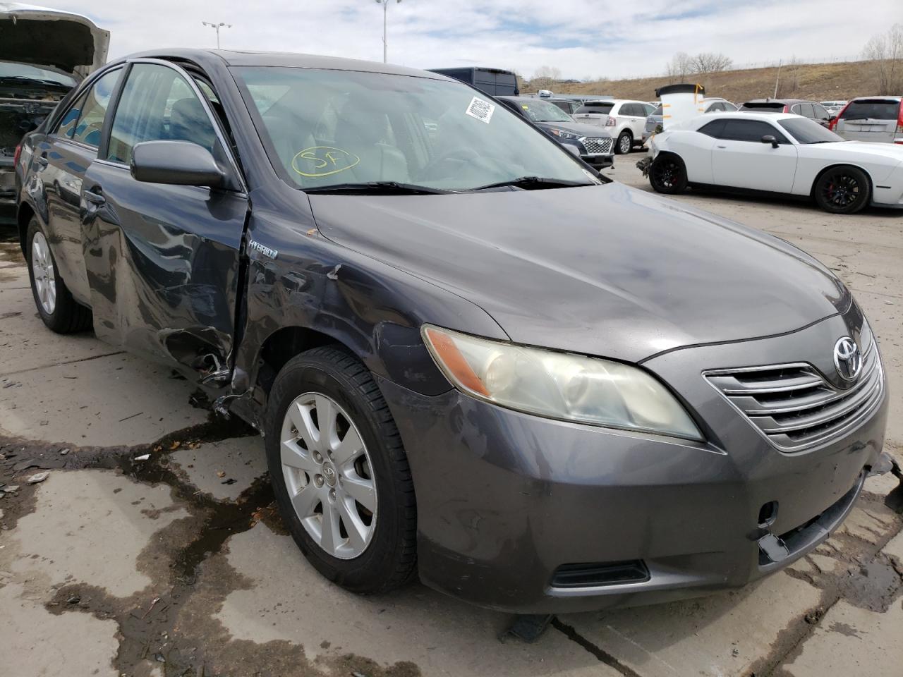 Photo 1 from auction – 2007 TOYOTA CAMRY HYBR with VIN JTNBB46K373019407