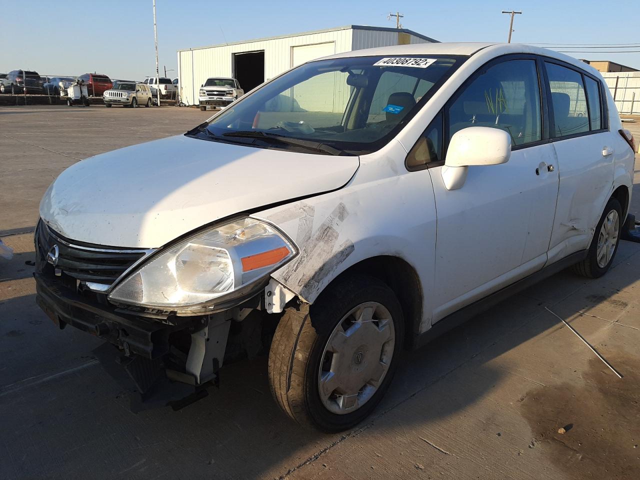 Фото 2 с аукциона – 2011 NISSAN VERSA S с VIN 3N1BC1CP8BL453970