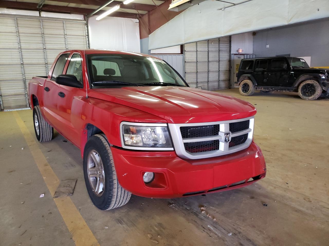 DODGE DAKOTA SLT 2011 with VIN 1D7RE3GK9BS511785 - Photo from auction