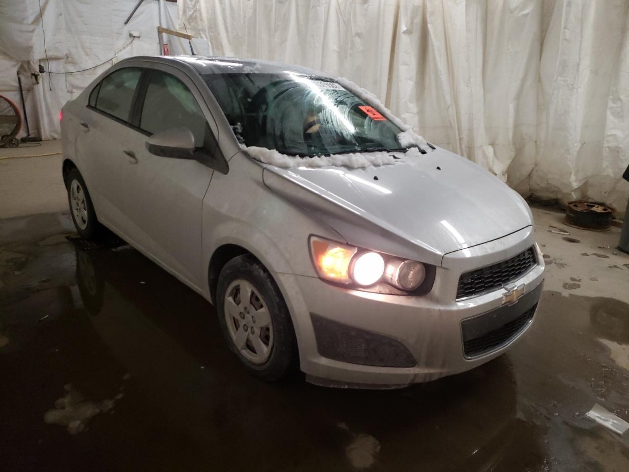 CHEVROLET SONIC LS 2014 with VIN 1G1JA5SG3E4234702 - Photo from auction
