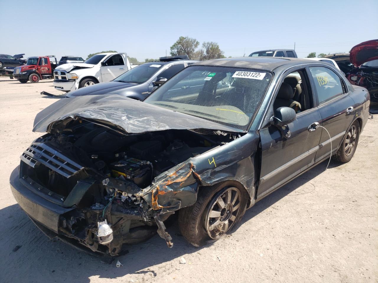 Photo 2 from auction – 2002 KIA OPTIMA MAG with VIN KNAGD128525118575