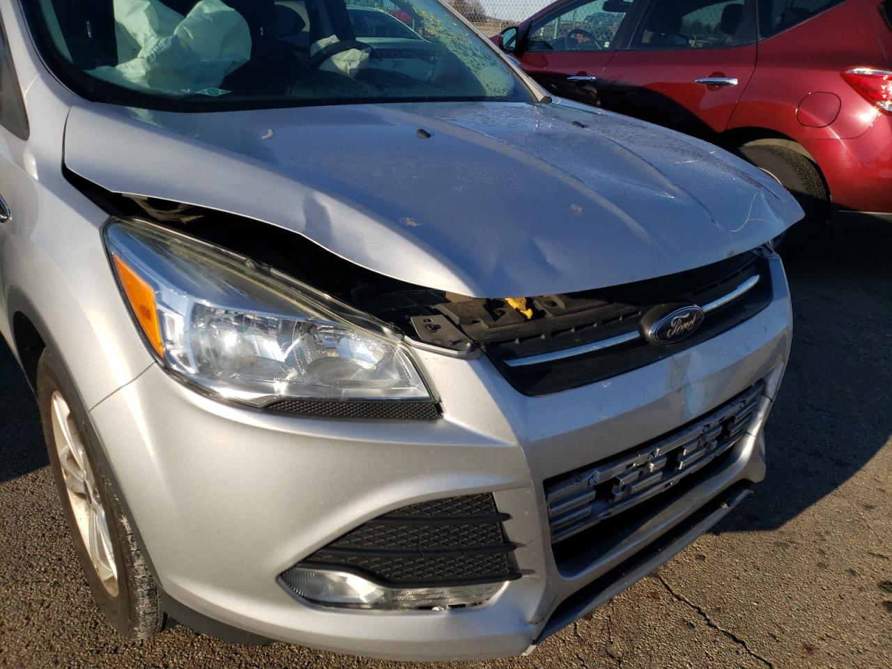 Photo 9 from auction – 2016 FORD ESCAPE SE with VIN 1FMCU0G77GUA43625