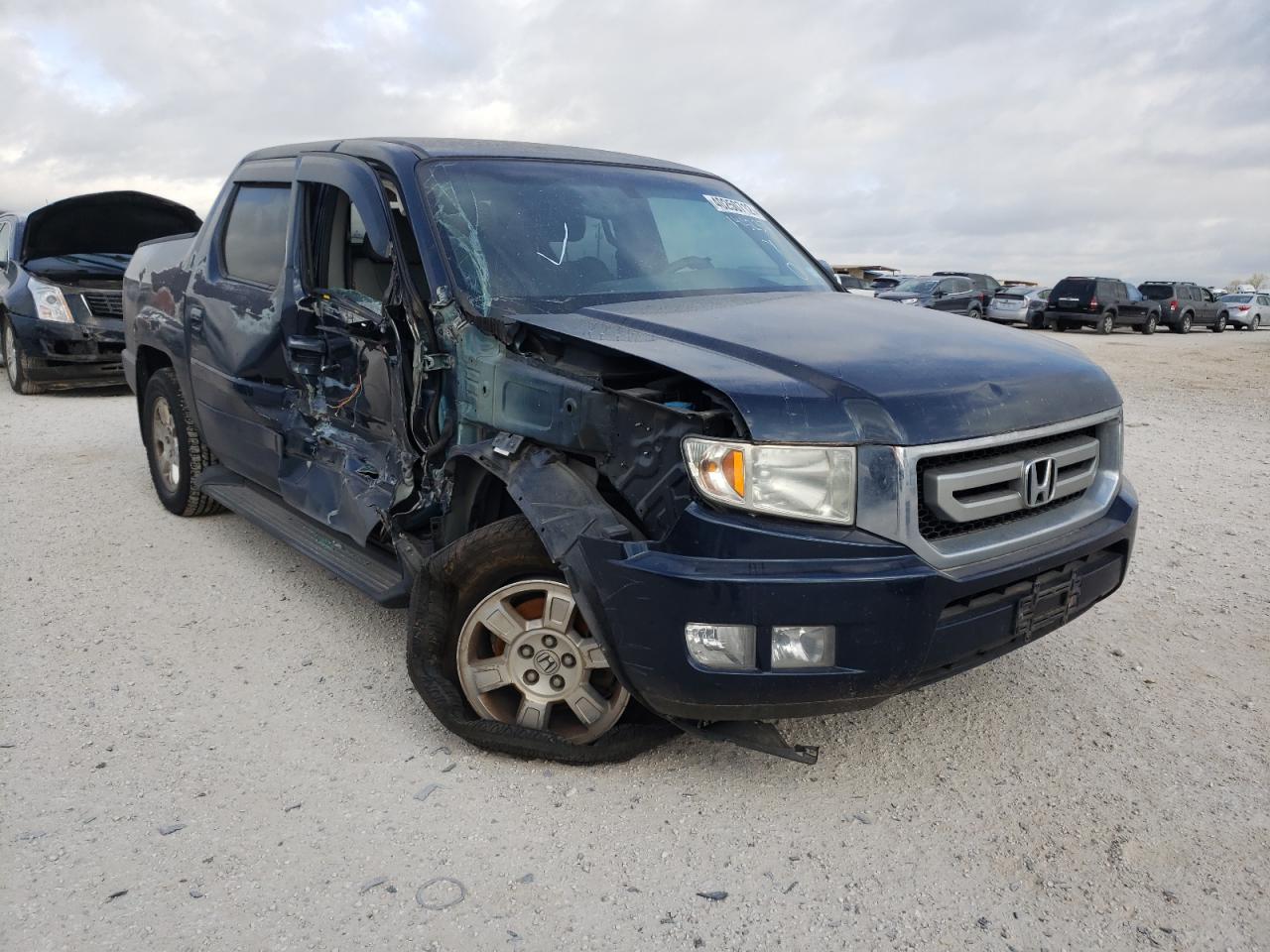 Photo 9 from auction – 2009 HONDA RIDGELINE with VIN 2HJYK16409H501746