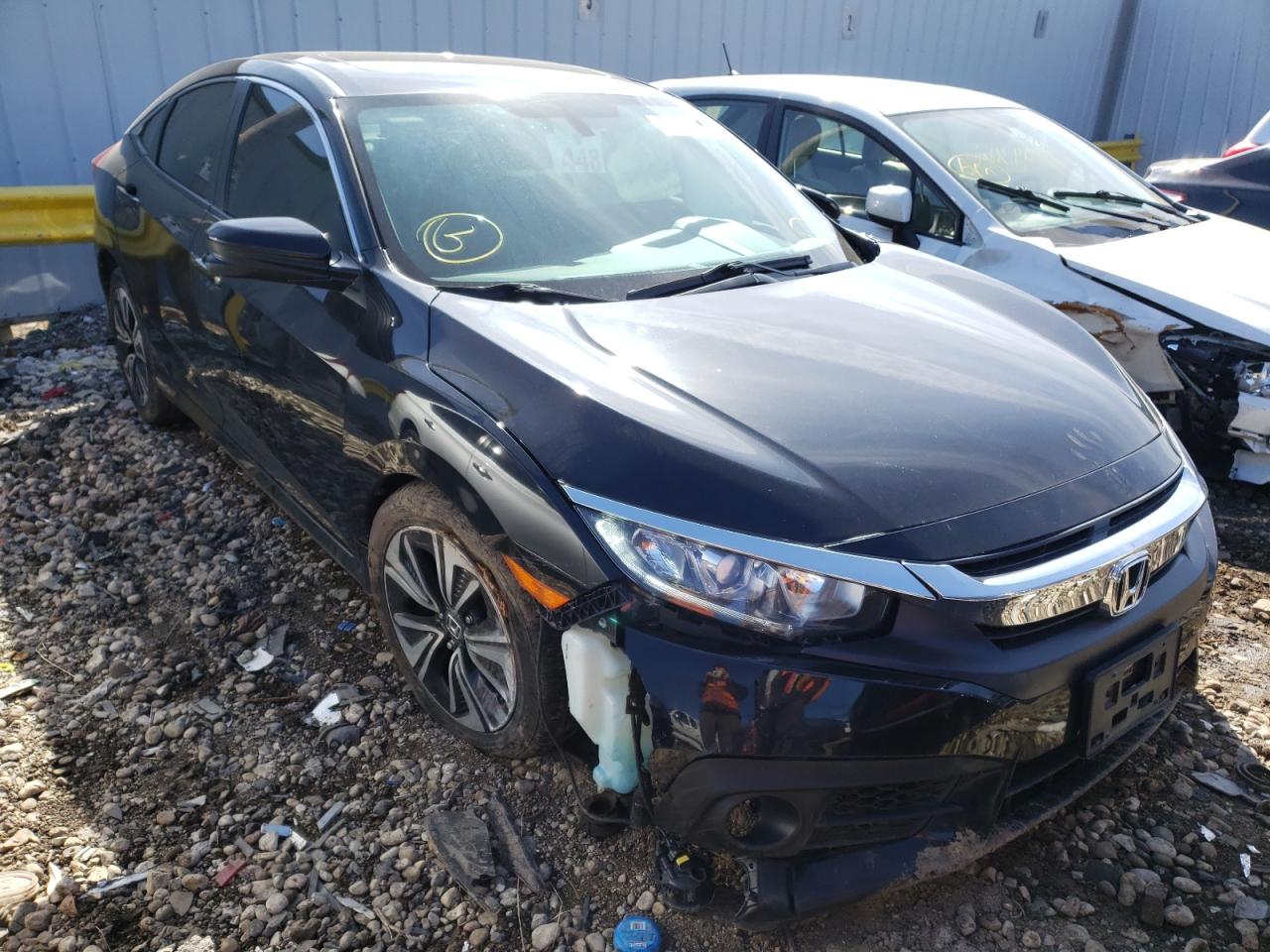 HONDA CIVIC EXL 2017 with VIN 19XFC1F77HE005372 - Photo from auction