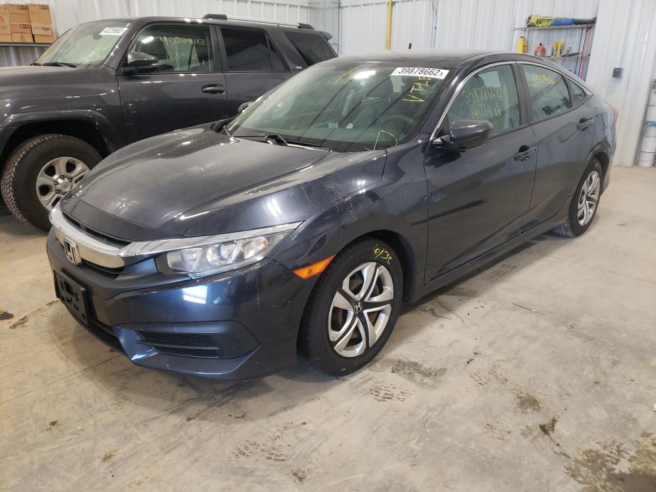 Photo 2 from auction – 2016 HONDA CIVIC LX with VIN 19XFC2F52GE065899