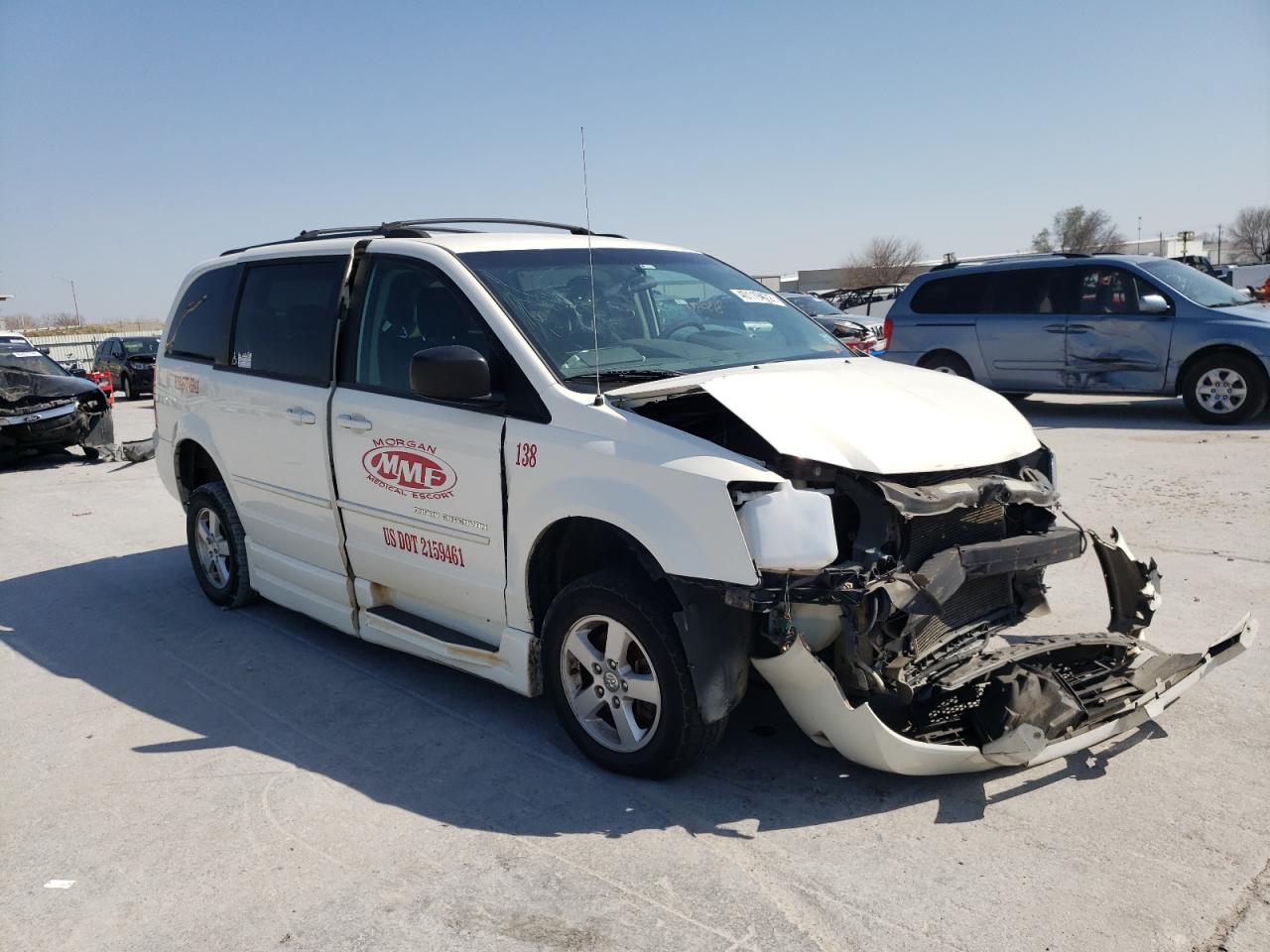 DODGE GRAND CARA 2010 with VIN 2D4RN4DE3AR339822 - Photo from auction