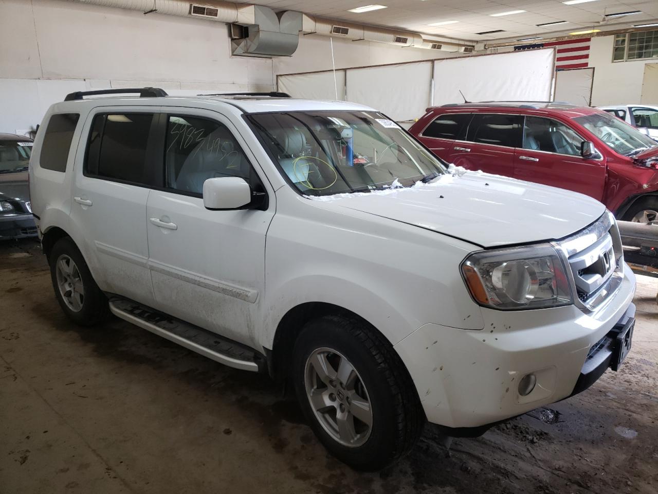 HONDA PILOT EXLN 2011 with VIN 5FNYF3H75BB033956 - Photo from auction