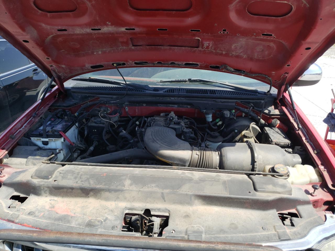 Photo 7 from auction – 2000 FORD F150 with VIN 1FTRX18W1YKB07463