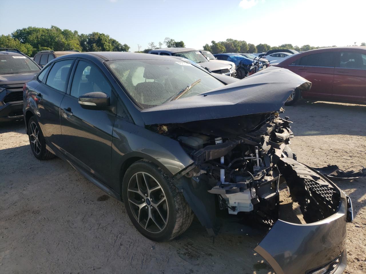 Photo 14 from auction – 2015 FORD FOCUS SE with VIN 1FADP3F28FL214397