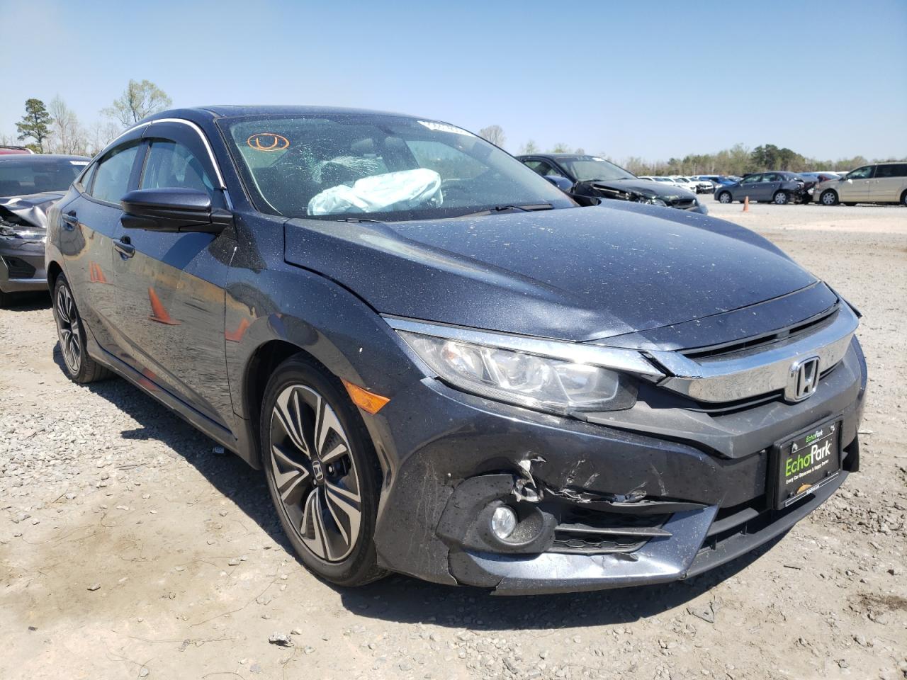 HONDA CIVIC EX 2016 with VIN 19XFC1F30GE041836 - Photo from auction