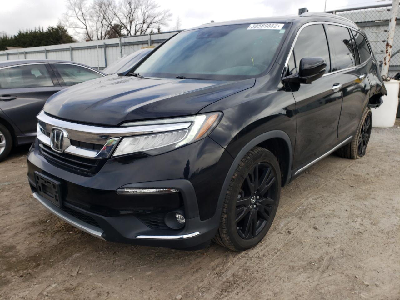Photo 2 from auction – 2019 HONDA PILOT TOUR with VIN 5FNYF6H64KB003226
