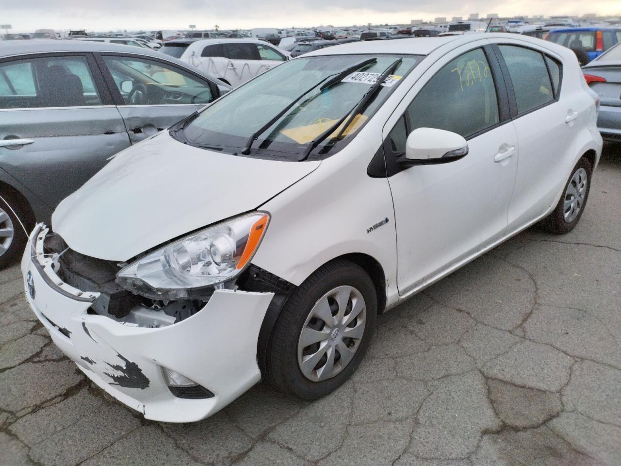 Photo 2 from auction – 2014 TOYOTA PRIUS C with VIN JTDKDTB38E1564809