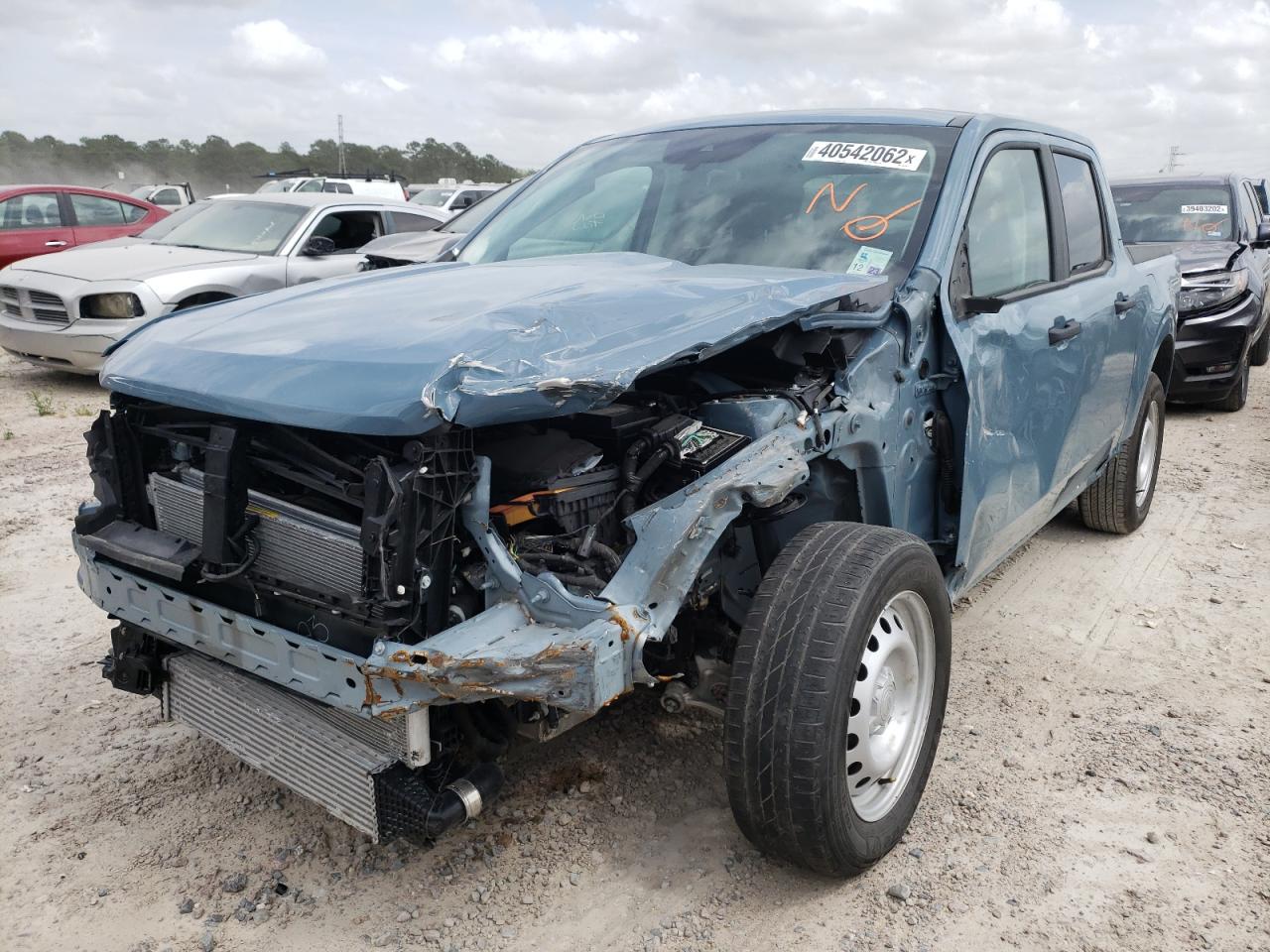 Photo 2 from auction – 2022 FORD MAVERICK X with VIN 3FTTW8E90NRA23108