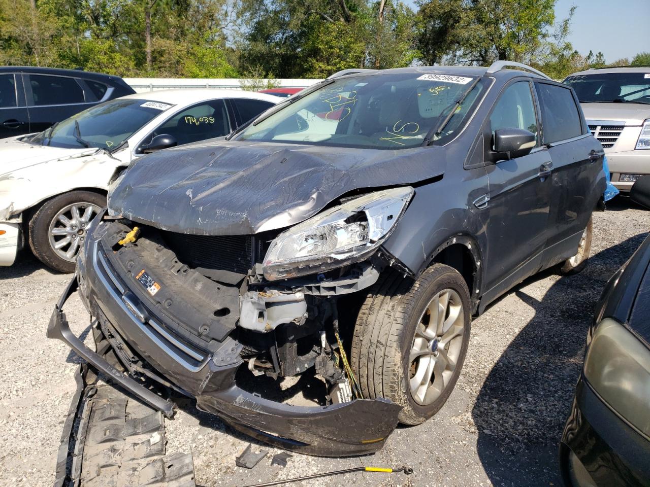Photo 2 from auction – 2014 FORD ESCAPE TIT with VIN 1FMCU9J96EUC21830