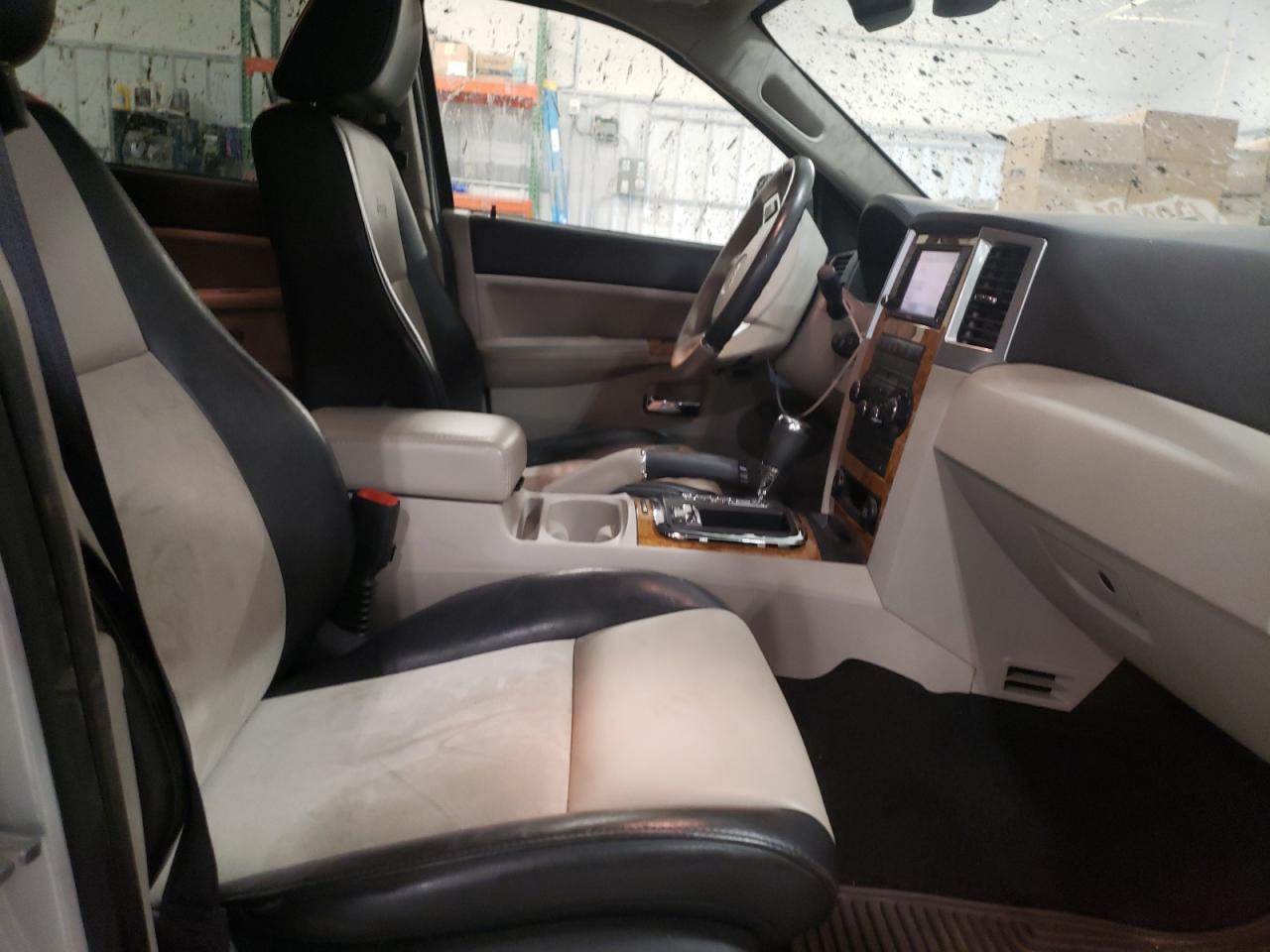 Photo 5 from auction – 2009 JEEP GRAND CHER with VIN 1J8HR58TX9C538679