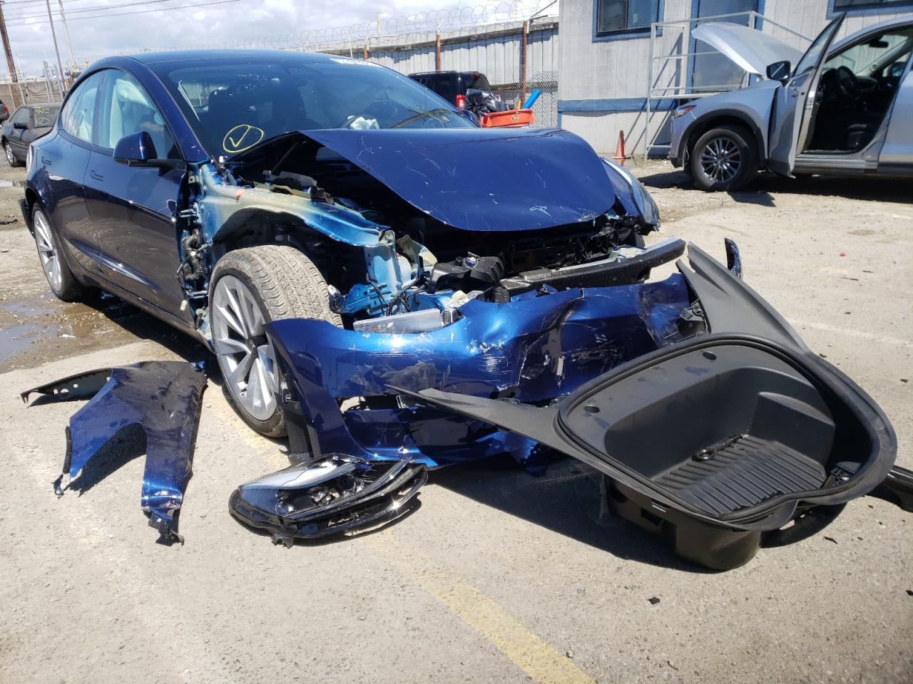 TESLA MODEL 3 2022 with VIN 5YJ3E1EA2NF143465 - Photo from auction