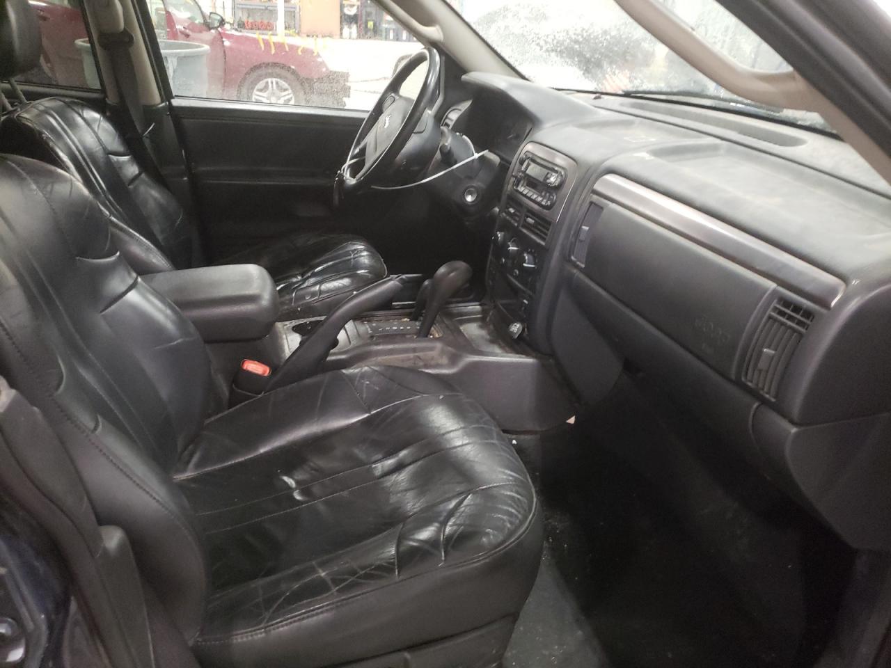 Photo 5 from auction – 2003 JEEP CHEROKEE with VIN 1J4GW48N13C524601