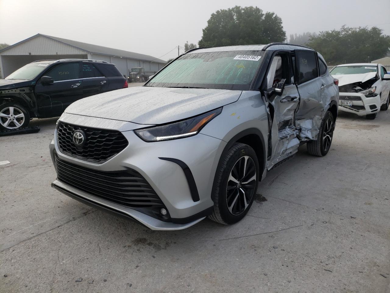 Photo 2 from auction – 2021 TOYOTA HIGHLANDER with VIN 5TDLZRBH5MS084328