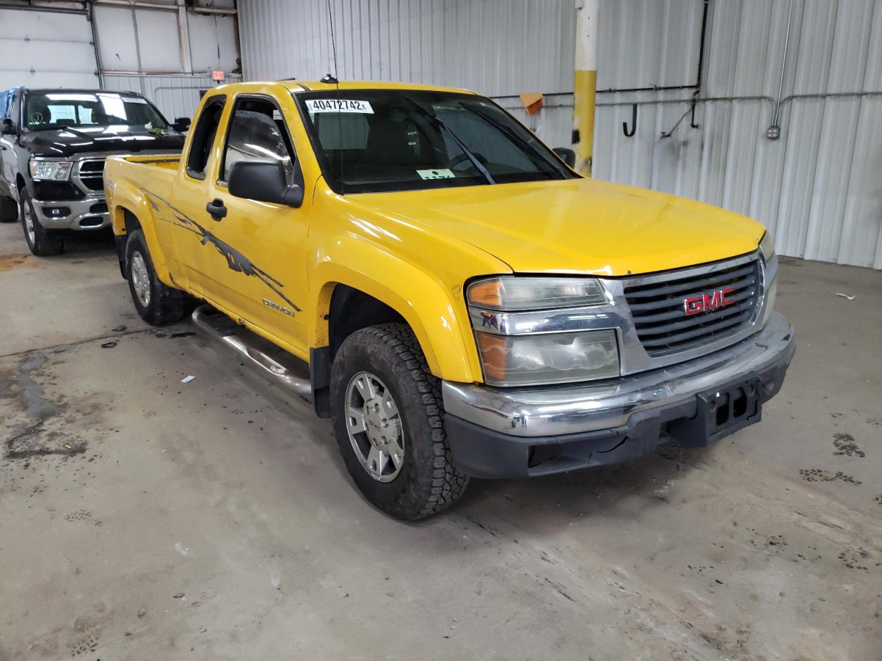 Photo 9 from auction – 2004 GMC CANYON with VIN 1GTDS196348201858