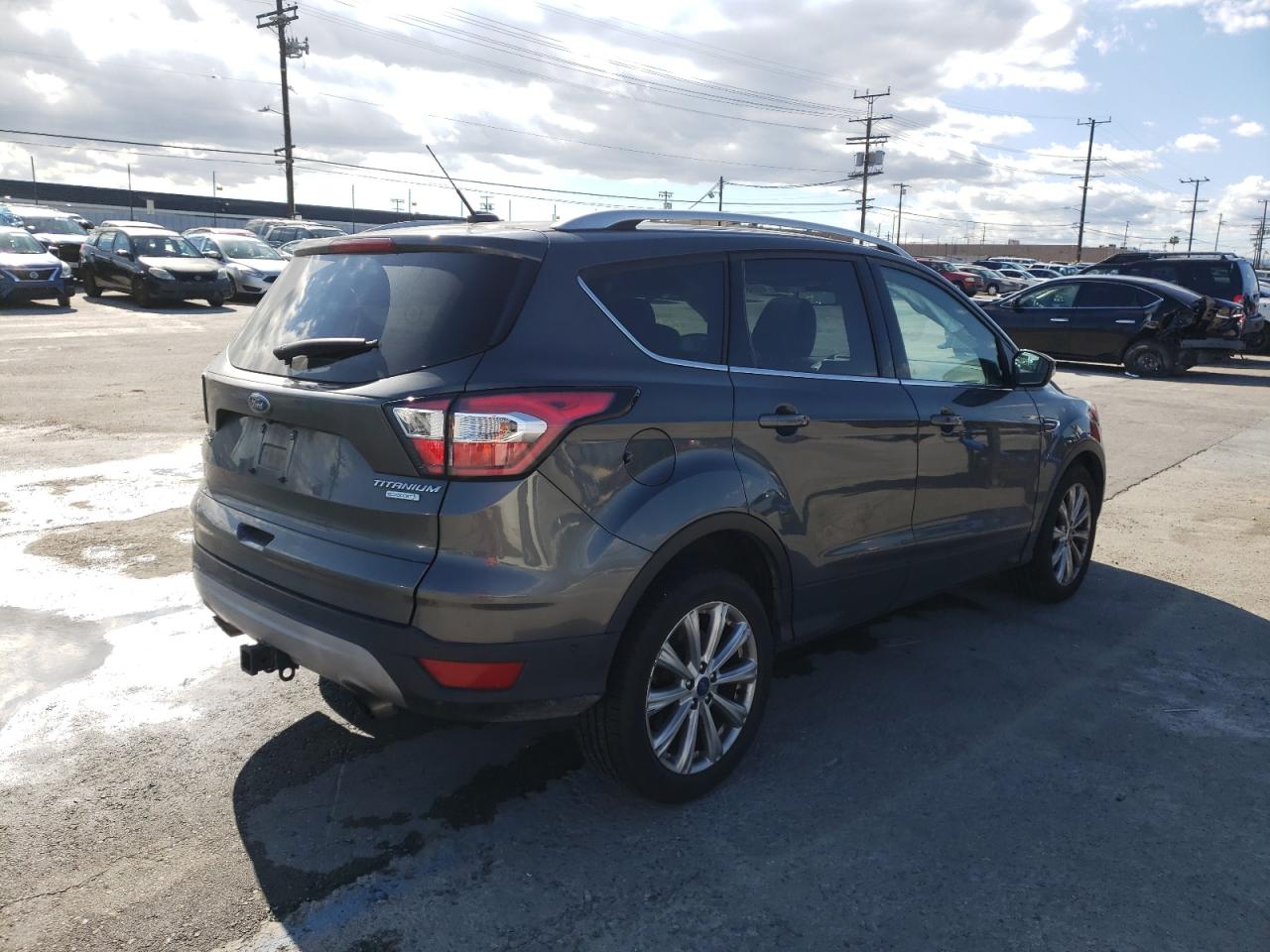 Photo 4 from auction – 2017 FORD ESCAPE TIT with VIN 1FMCU0JD0HUE24183
