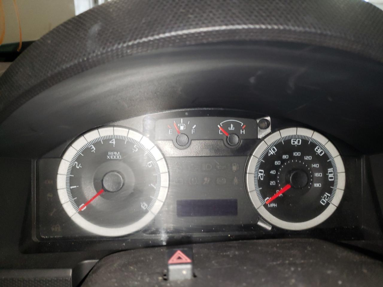 Photo 8 from auction – 2009 FORD ESCAPE LIM with VIN 1FMCU04G69KB78114