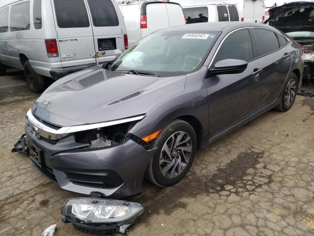 Photo 2 from auction – 2018 HONDA CIVIC EX with VIN 19XFC2F71JE202968