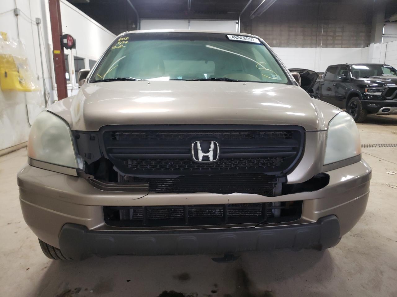 Photo 9 from auction – 2005 HONDA PILOT EX with VIN 5FNYF18475B036081