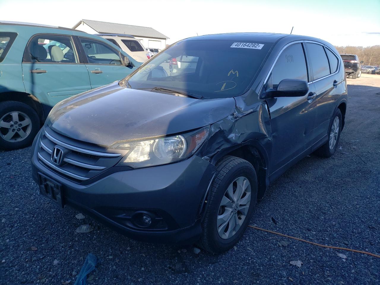 Photo 2 from auction – 2014 HONDA CR-V EX with VIN 5J6RM4H54EL064867