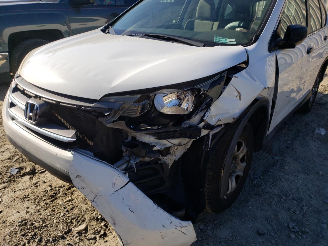 Photo 9 from auction – 2012 HONDA CR-V LX with VIN 2HKRM4H34CH625431