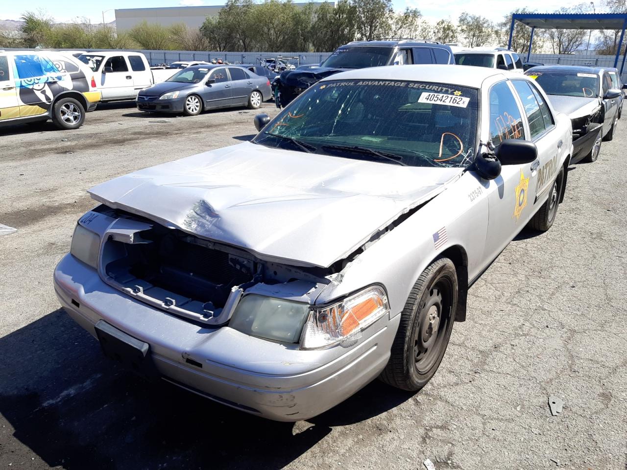 Photo 2 from auction – 2011 FORD CROWN VICT with VIN 2FABP7BV2BX182753