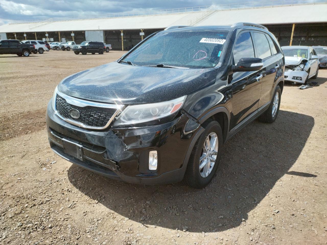 Photo 2 from auction – 2014 KIA SORENTO LX with VIN 5XYKTCA65EG496774