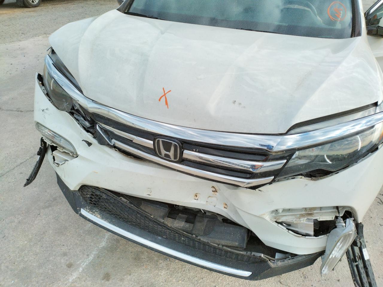 Photo 7 from auction – 2018 HONDA PILOT ELIT with VIN 5FNYF6H04JB041131