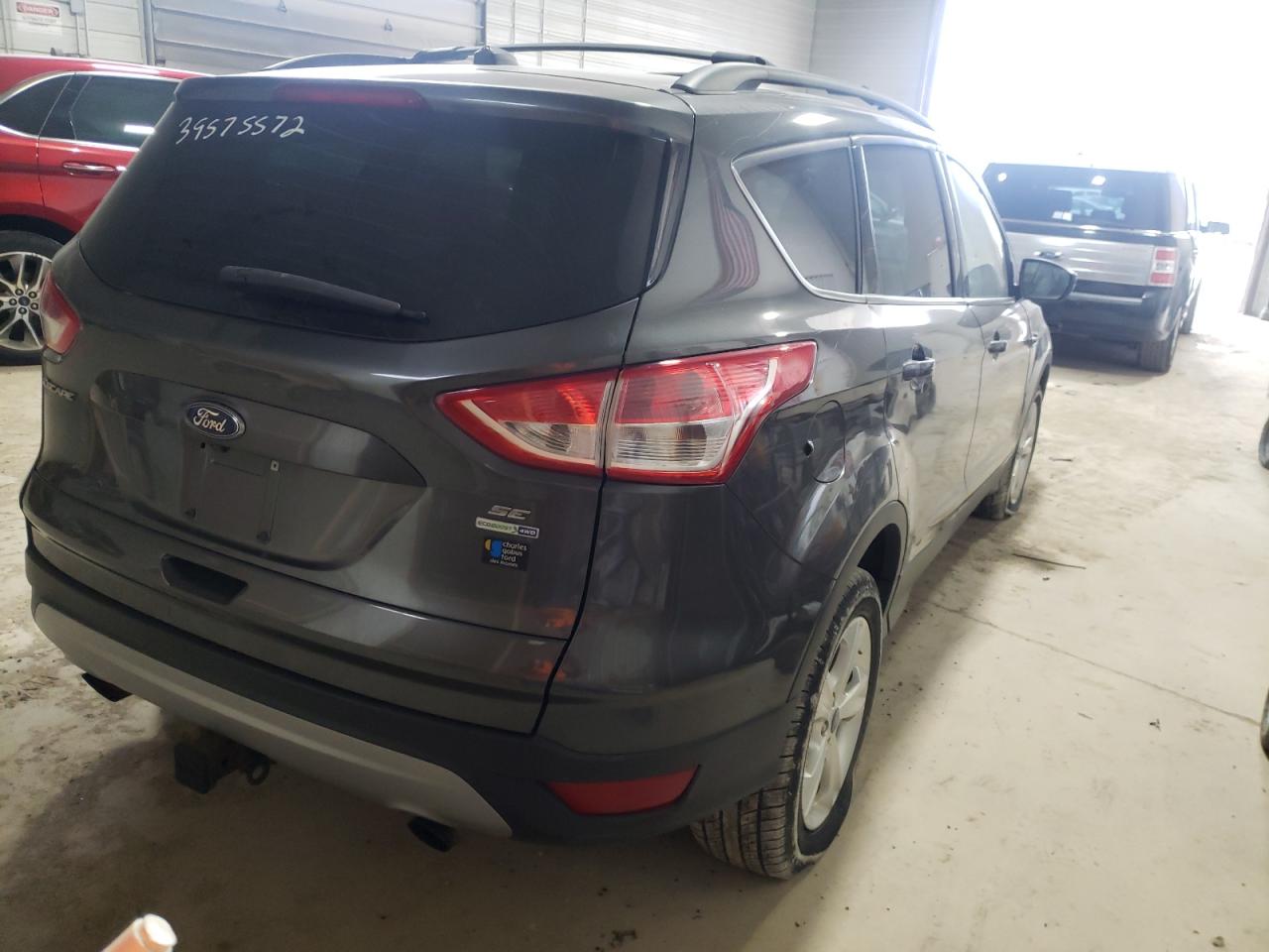 Photo 4 from auction – 2015 FORD ESCAPE SE with VIN 1FMCU9G96FUA75034