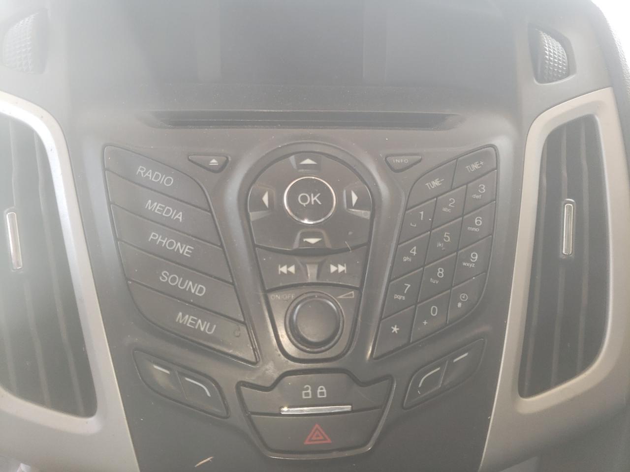 Photo 9 from auction – 2014 FORD FOCUS SE with VIN 1FADP3F21EL126435
