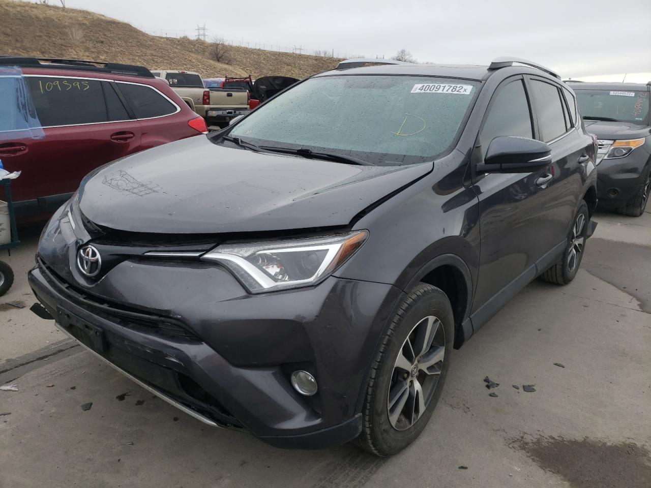 Photo 2 from auction – 2016 TOYOTA RAV4 XLE with VIN 2T3RFREV3GW439990