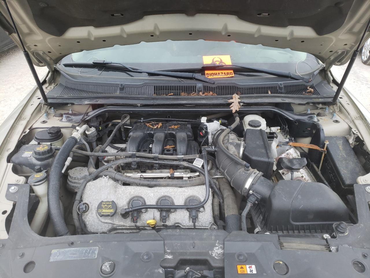 Photo 7 from auction – 2012 FORD TAURUS SEL with VIN 1FAHP2EW9CG118234