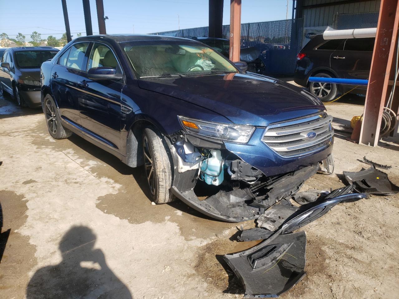 FORD TAURUS SEL 2016 with VIN 1FAHP2E86GG145043 - Photo from auction