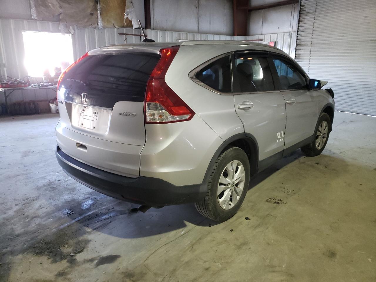 Photo 4 from auction – 2014 HONDA CR-V EXL with VIN 2HKRM4H71EH721121