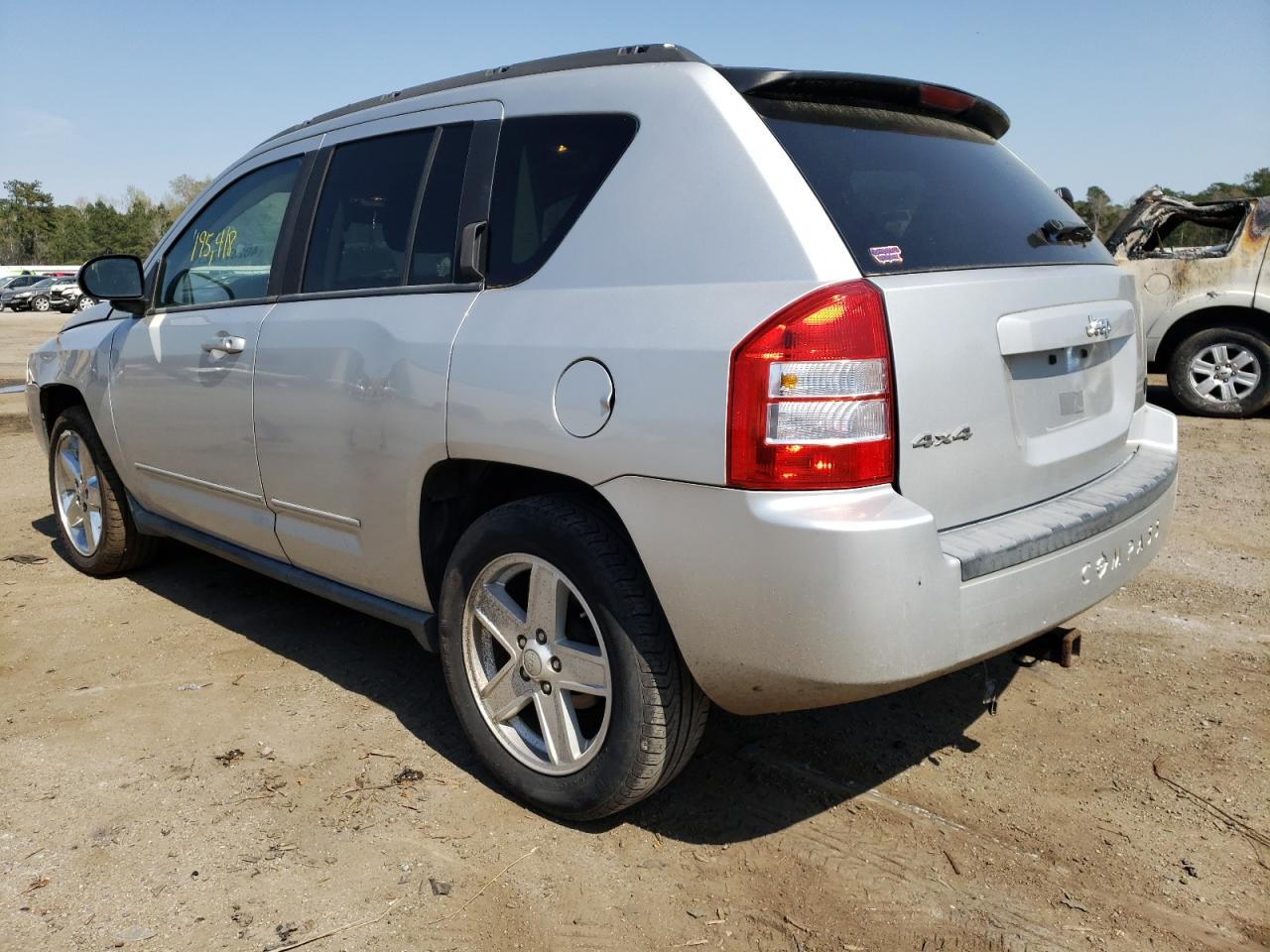 Photo 3 from auction – 2010 JEEP COMPASS SP with VIN 1J4NF4FB1AD593456