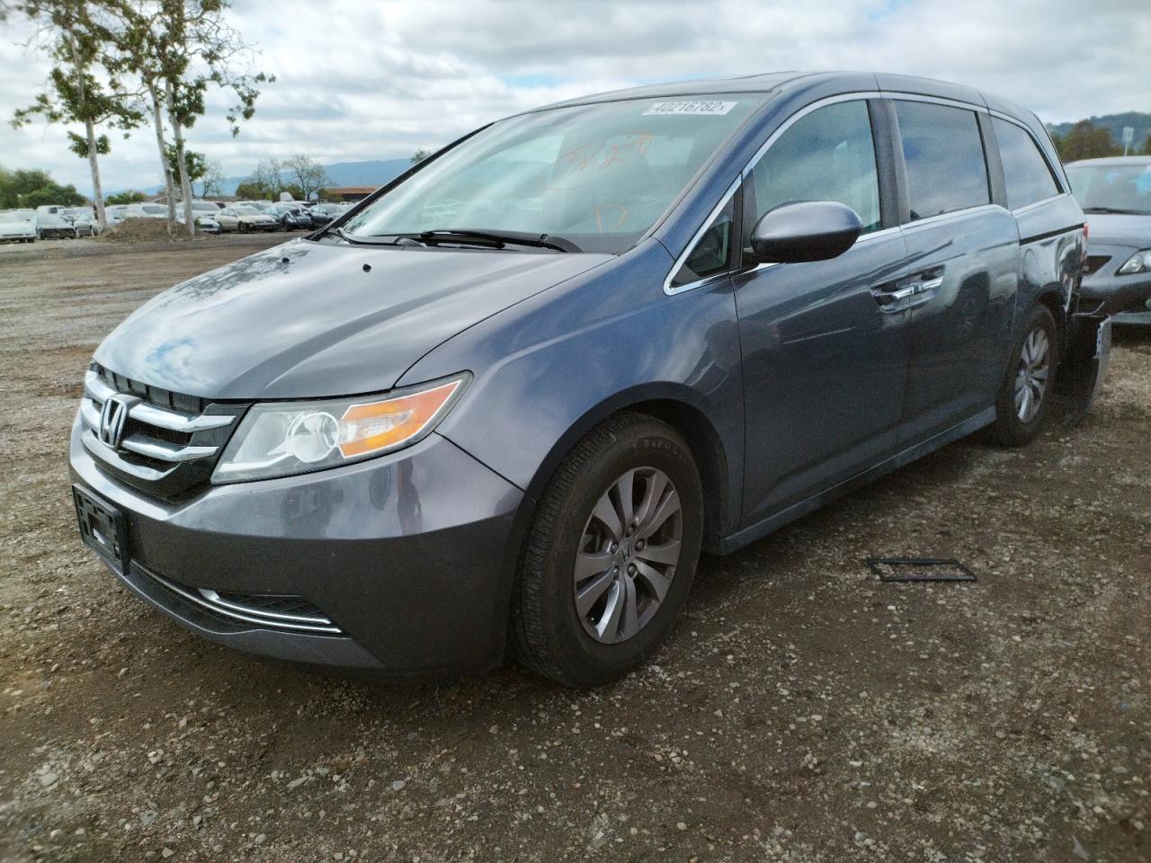 Photo 2 from auction – 2014 HONDA ODYSSEY EX with VIN 5FNRL5H67EB073685