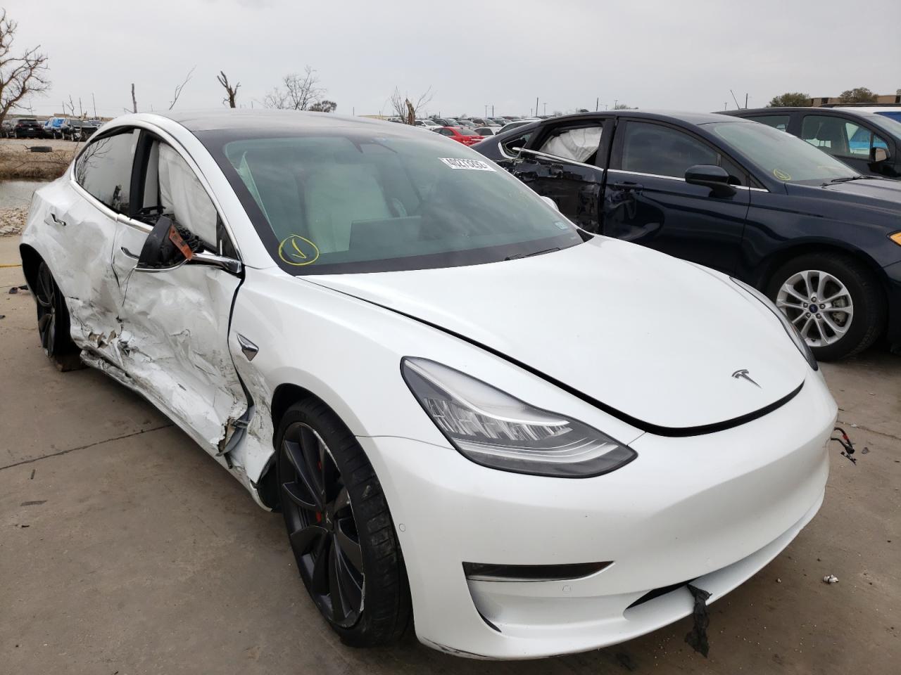 TESLA MODEL 3 2020 with VIN 5YJ3E1ECXLF642027 - Photo from auction