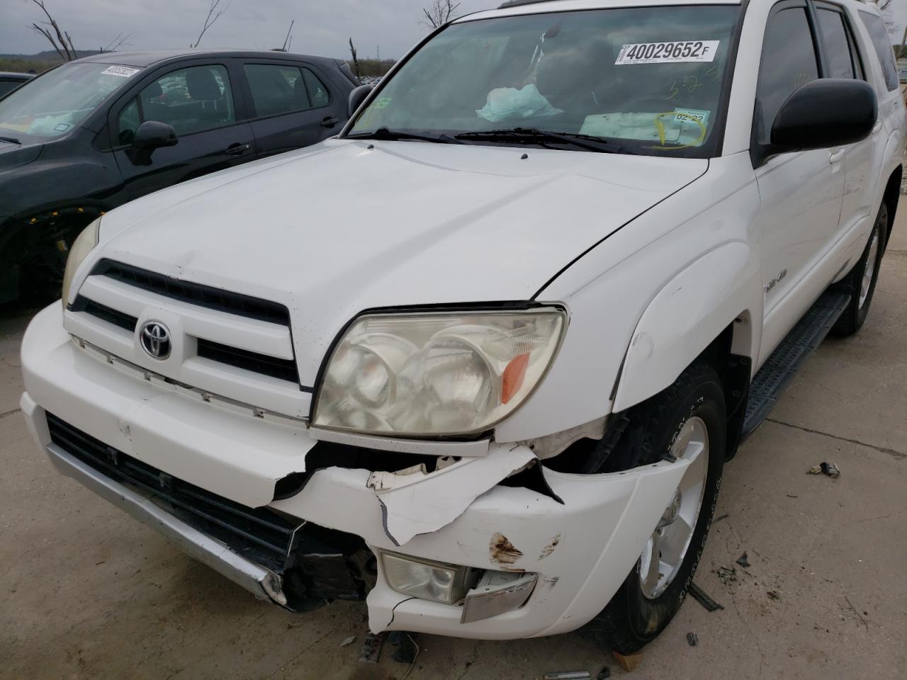 Photo 9 from auction – 2004 TOYOTA 4RUNNER SR with VIN JTEBU14R148019381