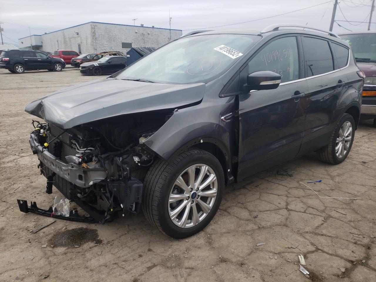 Photo 2 from auction – 2017 FORD ESCAPE TIT with VIN 1FMCU0JD6HUD05814
